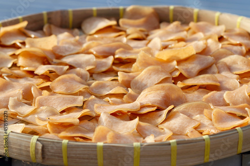 close up of a pile of chips (indonesian chips) kerupuk udang photo