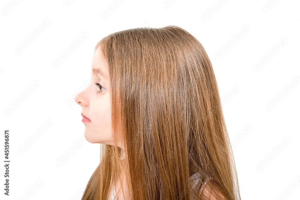 Portrait of a cute little girl, side view, isolated on white background Portrait of a cute little girl, side view, isolated on white background