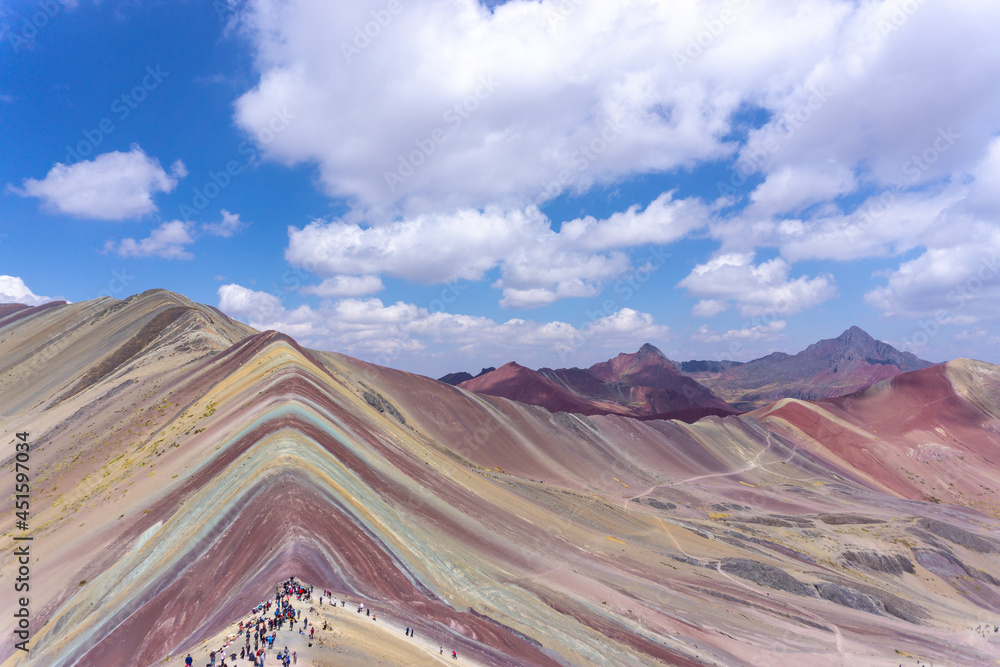 Rainbow Mountain, is a mountain in the Andes of Peru with an altitude of 5,200 metres above sea level. It is located on the road to the Ausangate mountain. Rainbow Mountain, is a mountain in the Andes of Peru with an altitude of 5,200 metres above sea level. It is located on the road to the Ausangate mountain.