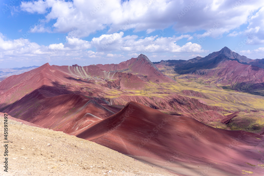 Fototapeta premium Rainbow Mountain, is a mountain in the Andes of Peru with an altitude of 5,200 metres above sea level. It is located on the road to the Ausangate mountain.
