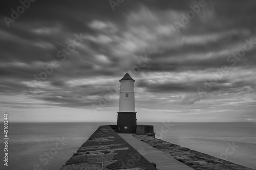 Berwick Upon Tweed lighthouse with dramatic skies above. located in Northumberland, England.