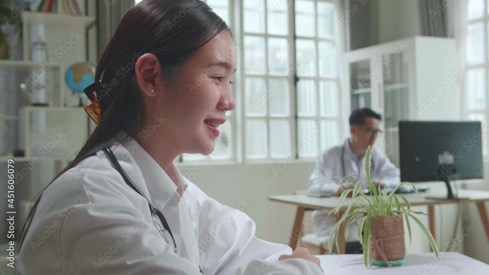 Close Up Asian Female Doctor Communicates With Patient By Video Link, Doctor Consults Patient Using Modern Technologies, Using Laptop Computer In Workplace
Close Up Asian Female Doctor Communicates With Patient By Video Link, Doctor Consults Patient Using Modern Technologies, Using Laptop Computer In Workplace