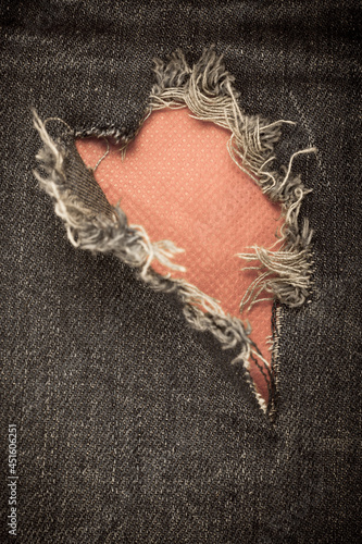 Torn denim vintage texture background.