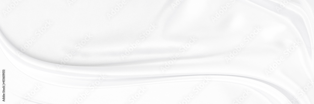 White gray satin texture that is white silver fabric silk background with beautiful soft blur pattern natural.