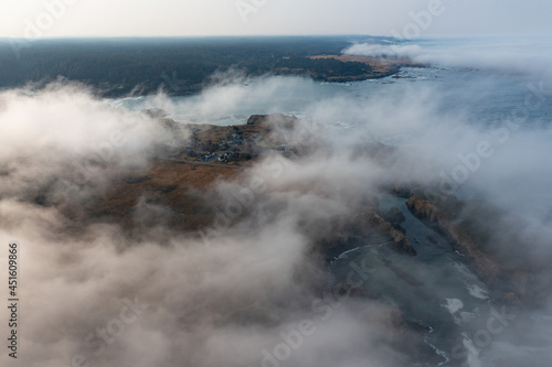 The marine layer is propelled against the coast of Mendocino  California  by a pressure gradient as a result of warmer inland temperatures. Much of Northern California experiences this common fog.
