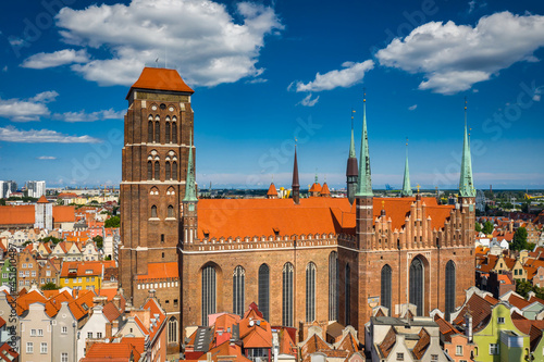 Beautiful architecture of the main city of Gdansk with the St. Marys basilica at summer. Poland