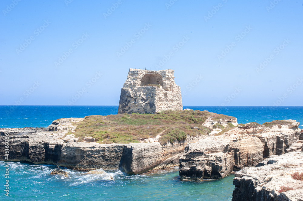 Torre di Roca Vecchia  on a white cliff of Italian adriatic coast by Mulino d'Acqua Beach by Grotta della Poesia