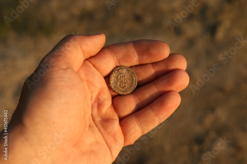 Old Russian Siberian copper coin in hand