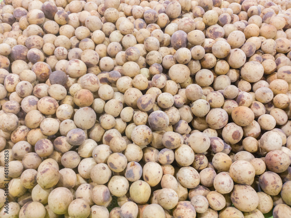 Asian fruit Langsat, Longkong, Duku, Lansium parasiticum, Lanzones or Lansones on sale at market Asian fruit Langsat, Longkong, Duku, Lansium parasiticum, Lanzones or Lansones on sale at market
