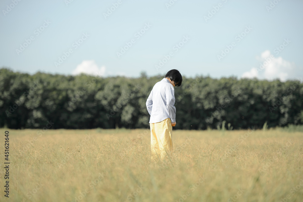 Young woman beautiful woman happy at the beautiful meadow at sky background. happiness concept. Young woman beautiful woman happy at the beautiful meadow at sky background. happiness concept.