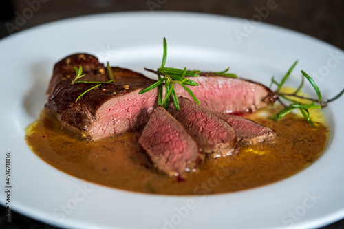 Принти на полотні fresh cooking at home and ready to eat, delicious medium roasted game meat from