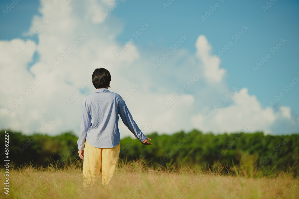 Young woman beautiful woman happy at the beautiful meadow at sky background. happiness concept. Young woman beautiful woman happy at the beautiful meadow at sky background. happiness concept.