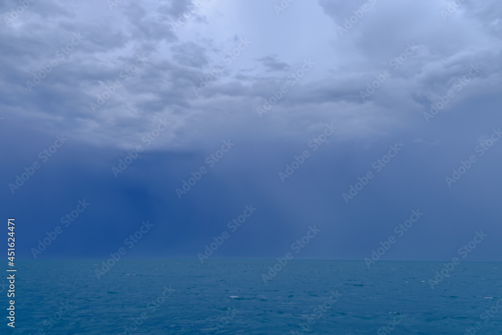 A large rain storm brews in the open waters between Key west and the Dry tortugas seventy miles out in the Gulf of Mexico A large rain storm brews in the open waters between Key west and the Dry tortugas seventy miles out in the Gulf of Mexico
