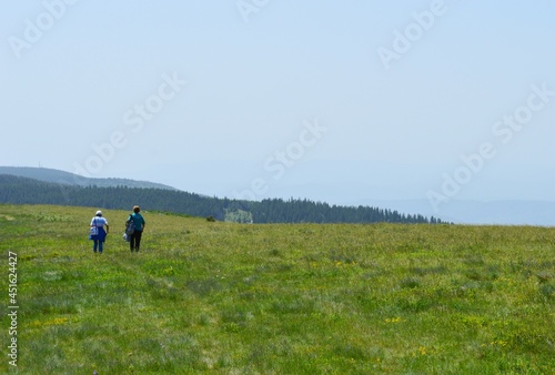 people on a hiking trail in the mountains © oljasimovic