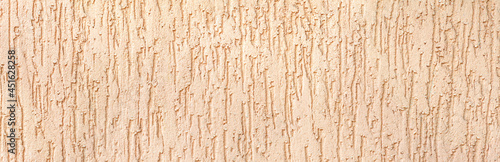Textured surface coat plaster walls beige color. Panorama. Banner.