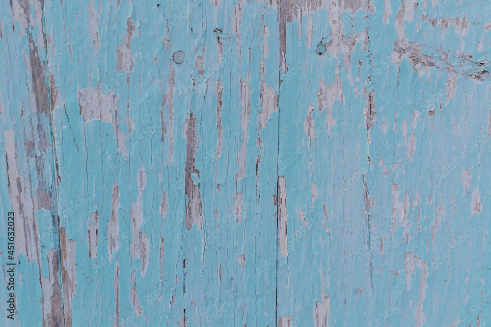 textured old wooden background with remnants of blue paint and scratches. pine plank barn wall for design and lettering. Copy space textured old wooden background with remnants of blue paint and scratches. pine plank barn wall for design and lettering. Copy space
