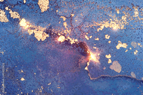 Abstract light blue and gold fluid art alcohol ink pattern with marble texture. Modern luxury background with watercolor splash and golden glitter for poster, flyer, brochure design.