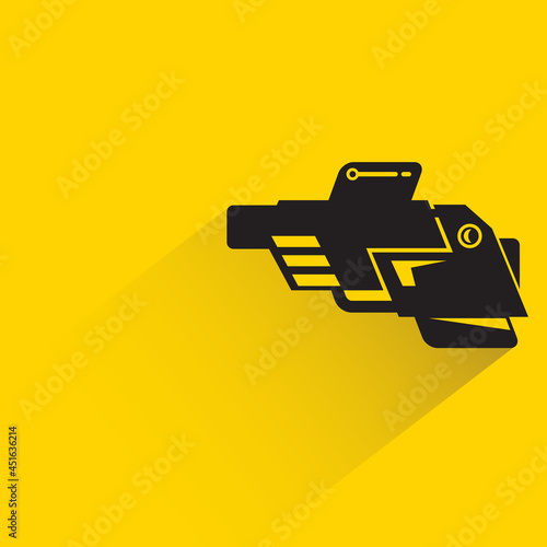 space blaster gun or fantastic raygun icon on yellow background