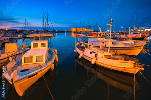 Venetian Fort in Heraklion and moored fishing boats, Crete Island, Greece © Dmitry Rukhlenko