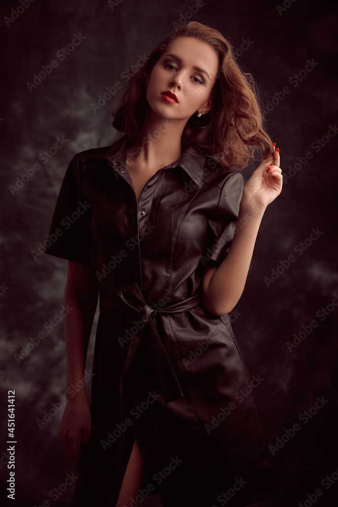 model in leather dress