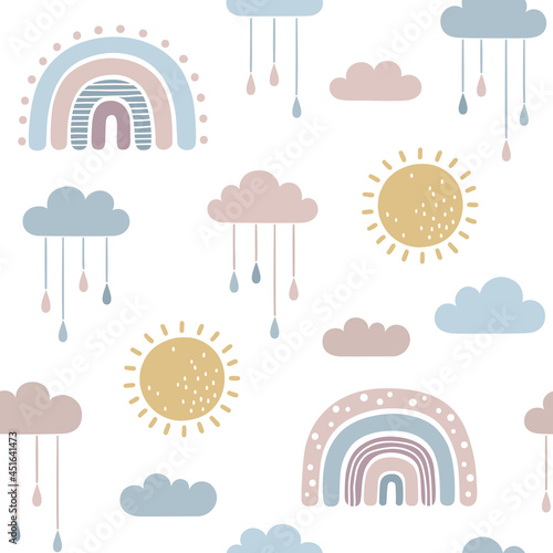 Seamless pattern with rainbows, sun and raindrops hanging from clouds in naive, childlike doodle style