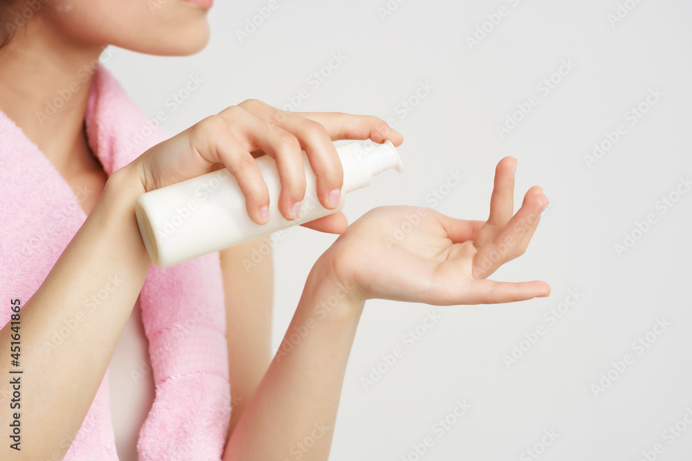 woman with towel on shoulders skin lotion spa treatments clean skin woman with towel on shoulders skin lotion spa treatments clean skin