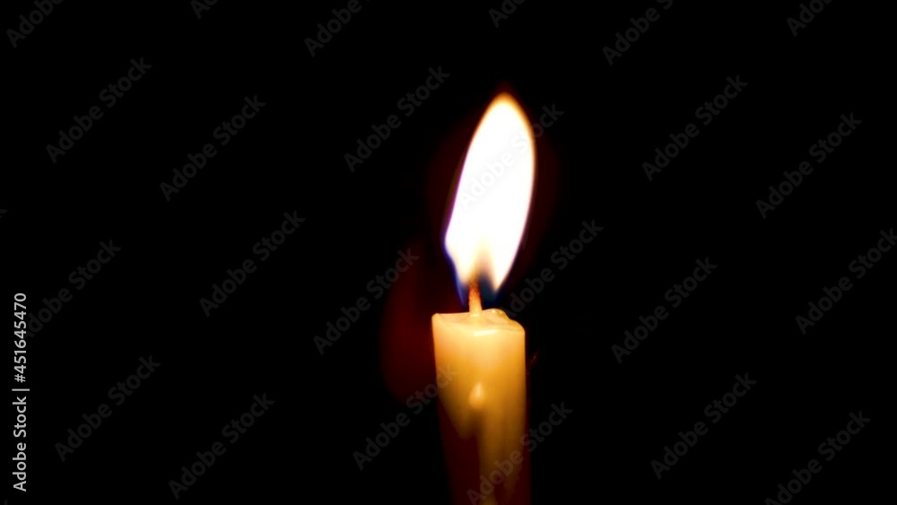 Close-up of the flame burning on the candle with isolated on a black background. Candle flame in the dark.
Close-up of the flame burning on the candle with isolated on a black background. Candle flame in the dark.