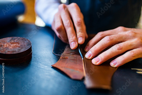 creating process of the leather things in the handmade workshop