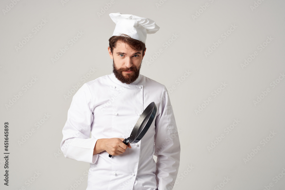 a man in a chef's uniform restaurant provision of services culinary industry a man in a chef's uniform restaurant provision of services culinary industry