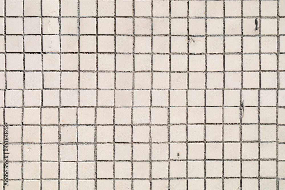 texture of small mosaic tiles and cement close up texture of small mosaic tiles and cement close up