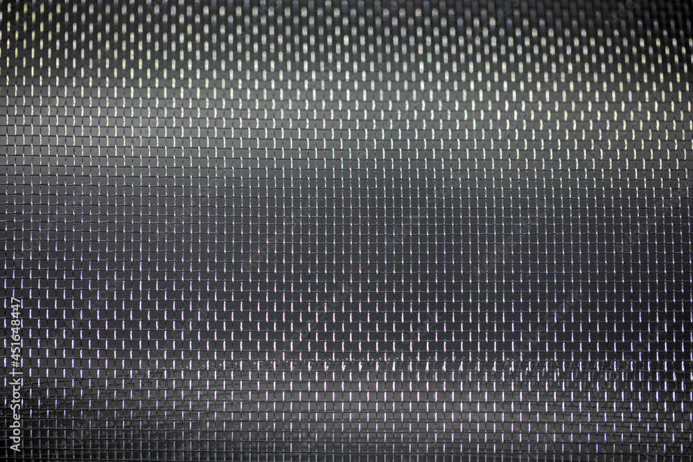 silver aluminum mesh on black background silver aluminum mesh on black background