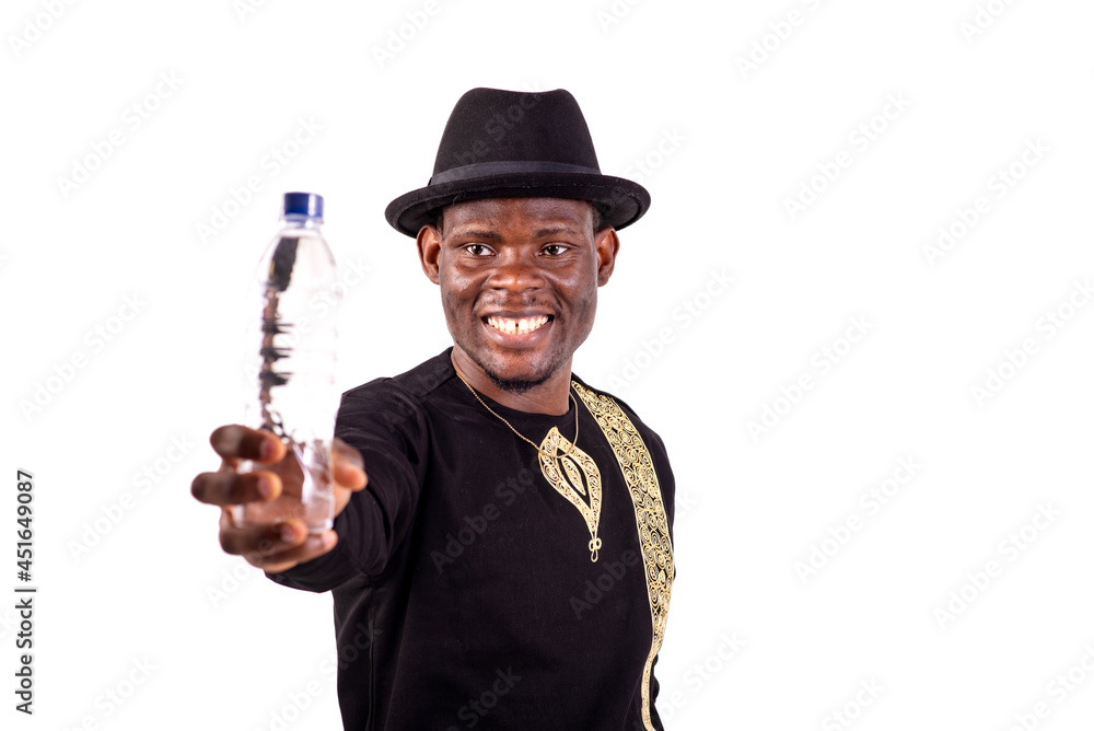 close-up of a handsome businessman presenting a bottle of water, happy close-up of a handsome businessman presenting a bottle of water, happy