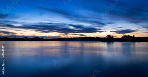 Midnight panorama landscape on Swedish lake