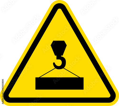 Overhead crane hazard sign. Black on yellow background. Safety signs and symbols.