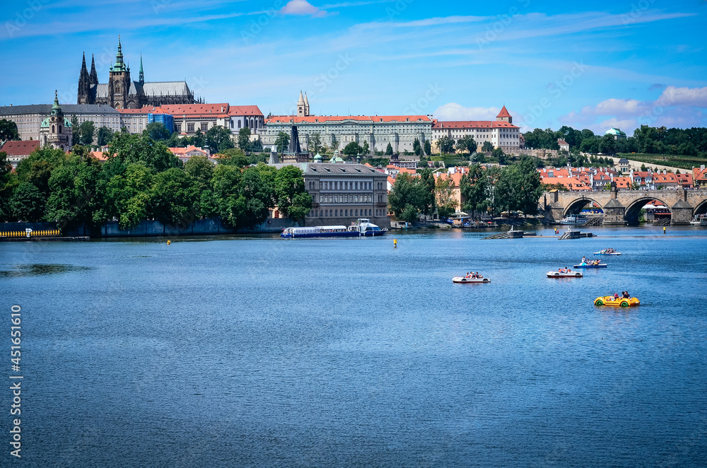 Obraz premium Charles Bridge (a.k.a. Stone Bridge, Kamenny most, Prague Bridge, Prazhski most) over Vltava river in Prague, Czech Republic.