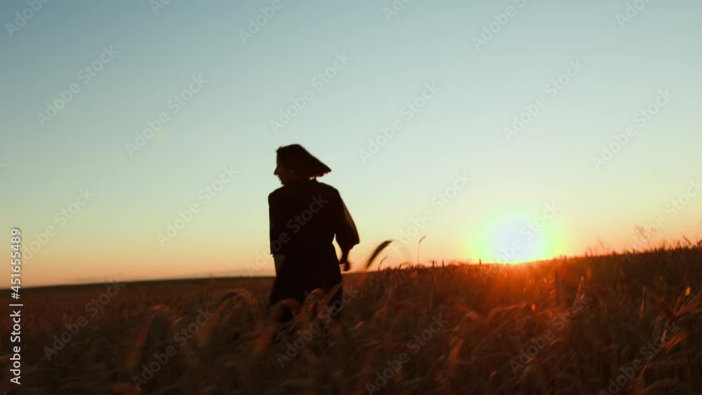 free girl run fun across the wheat field. agriculture kid children dream concept. girl farmer hands to sides runs across the wheat field. happy free girl run in park agricultural land free girl run fun across the wheat field. agriculture kid children dream concept. girl farmer hands to sides runs across the wheat field. happy free girl run in park agricultural land