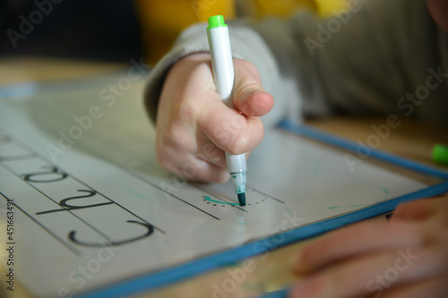 Foto hand writing on a notebook