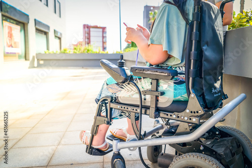 disabled young woman in wheelchair