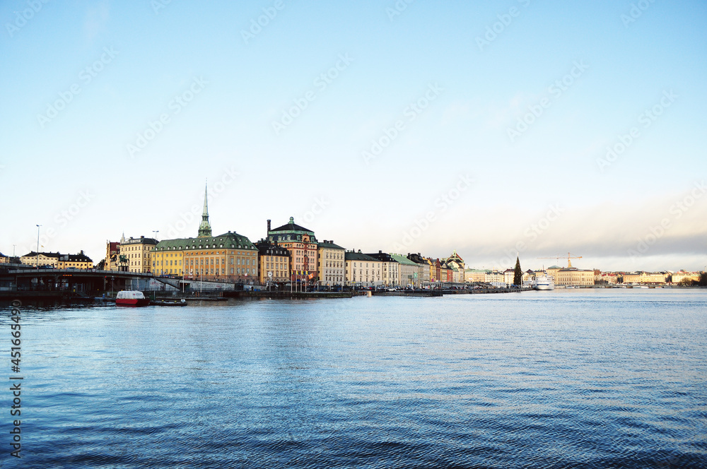 STOCKHOLM, SWEDEN: Scenic cityscape view of old city center Gamla Stan with colorful buildings near the water