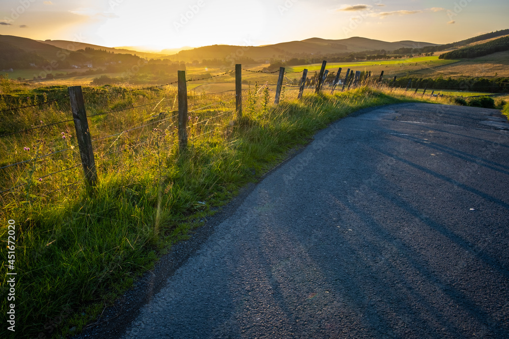 Country Road In Scotland At Sunset