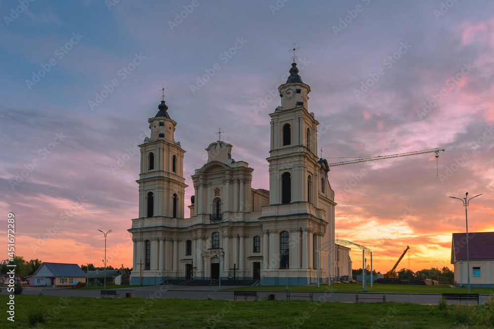 The view of Catholic church in Budslav, Belarus in the sunset light