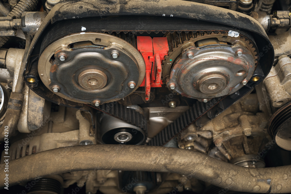 Naklejka premium Installed new timing belt on camshafts, close-up