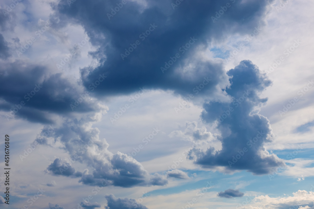 Obraz premium Clouds frame on blue sky. Beautiful air background with free space.