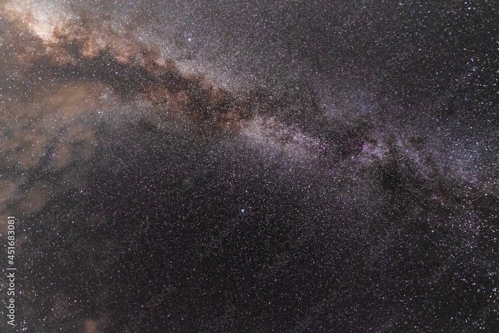 Obraz premium Beautiful bright milky way galaxy on the dark sttary sky. Space, astronomical background. Space wallpaper.