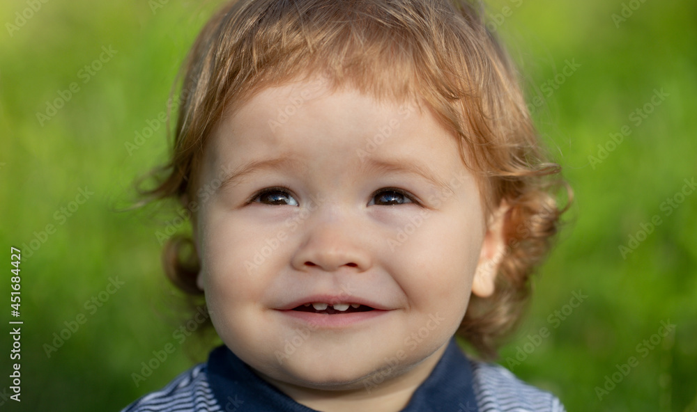 Portrait of a cute funny child baby boy. Close up caucasian kids face. Funny kid outdoor. Portrait of a cute funny child baby boy. Close up caucasian kids face. Funny kid outdoor.