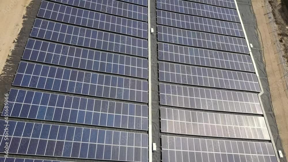 Aerial video of solar panels during daytime. Aerial video of solar panels during daytime.