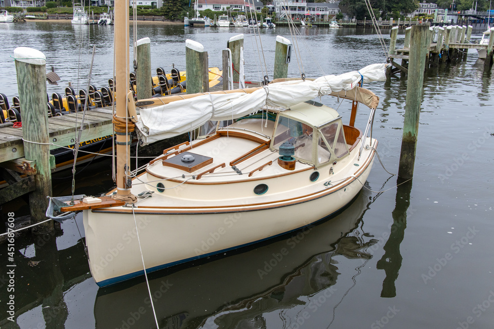 old sailboat docked in harbor