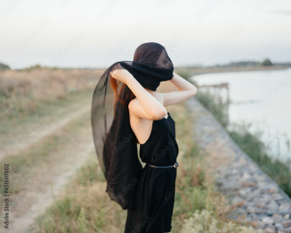 woman in black veil outdoors travel fashion fresh air woman in black veil outdoors travel fashion fresh air