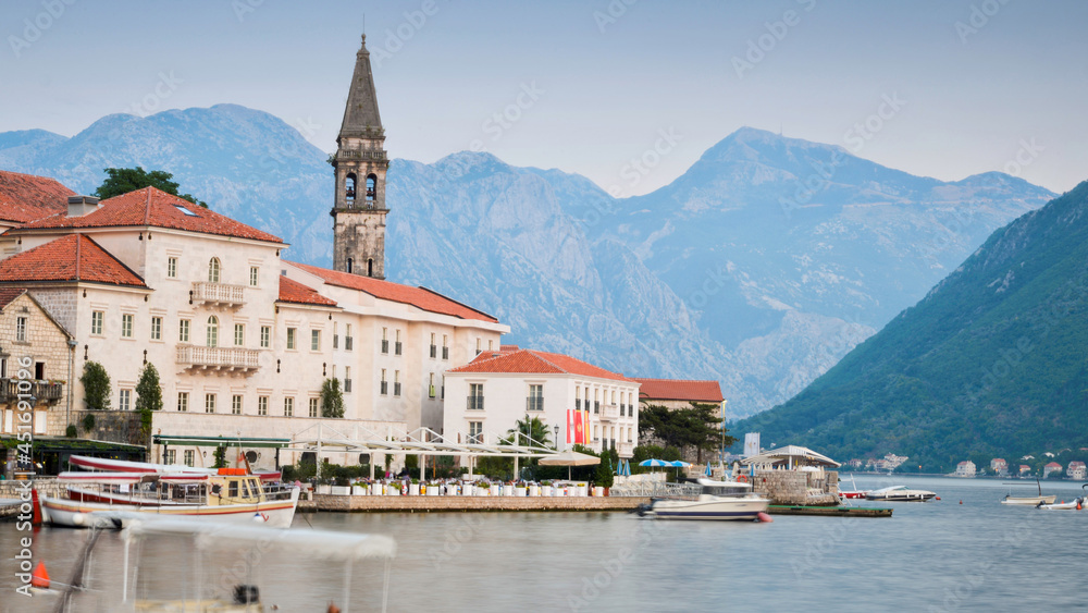 Fototapeta premium Perast,Montenegro,along the Bay of Kotor,and dramatic mountains overlooking it's calm waters.