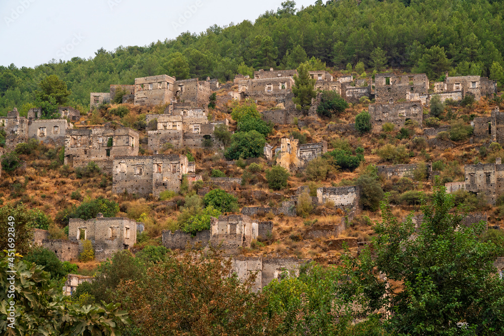 Kayaköy village serves as a museum and is a historical monument. Around 500 houses remain as ruins and are under the protection of the Turkish government, including two Greek Orthodox Churches
